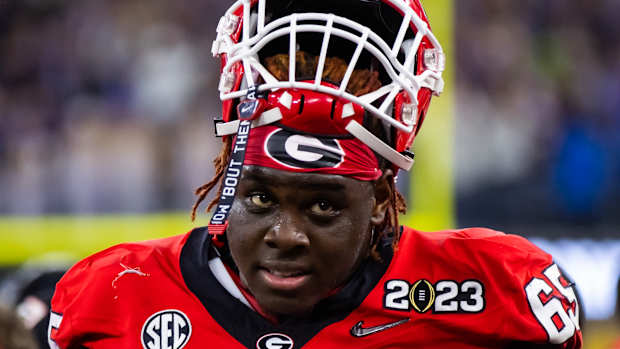 Jan 9, 2023; Inglewood, CA, USA; Georgia Bulldogs offensive lineman Amarius Mims (65) against the TCU Horned Frogs during the CFP national championship game at SoFi Stadium. Mandatory Credit: Mark J. Rebilas-USA TODAY Sports